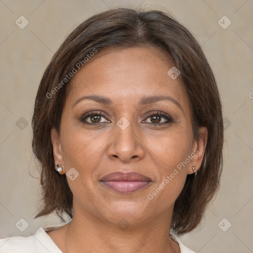 Joyful white adult female with medium  brown hair and brown eyes