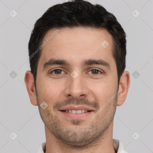 Joyful white young-adult male with short  brown hair and brown eyes