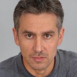 Neutral white adult male with short  brown hair and brown eyes