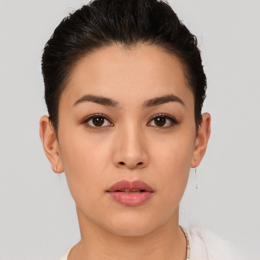 Neutral white young-adult female with short  brown hair and brown eyes