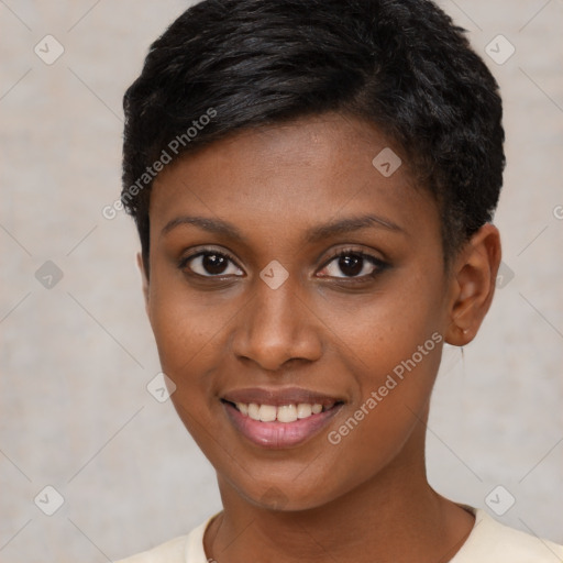 Joyful black young-adult female with short  brown hair and brown eyes