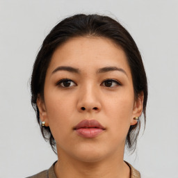 Neutral asian young-adult female with medium  brown hair and brown eyes