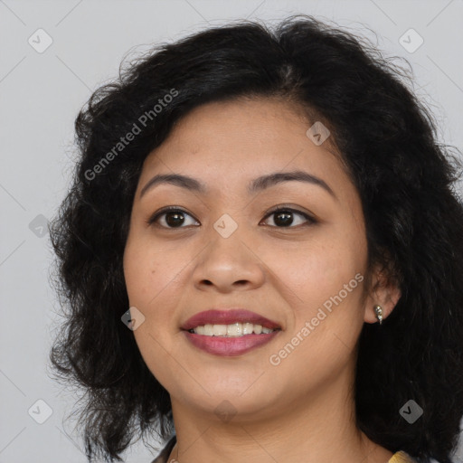 Joyful asian young-adult female with long  brown hair and brown eyes