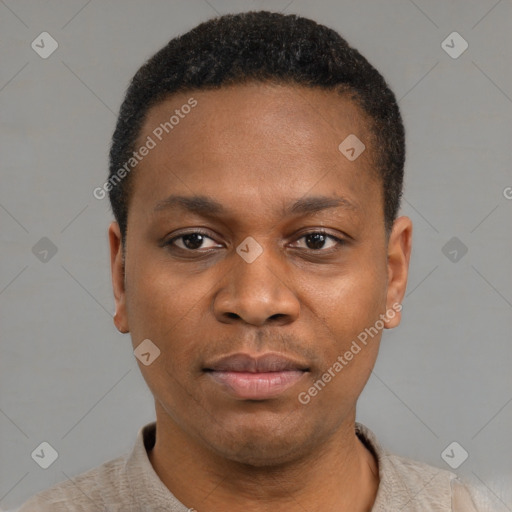 Neutral black young-adult male with short  black hair and brown eyes