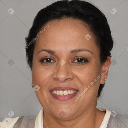 Joyful latino adult female with short  brown hair and brown eyes