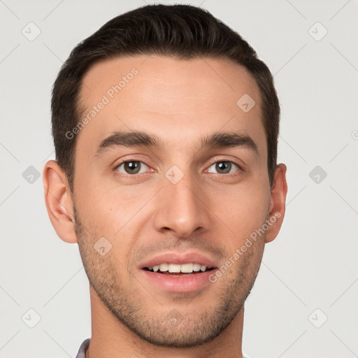 Joyful white young-adult male with short  brown hair and brown eyes