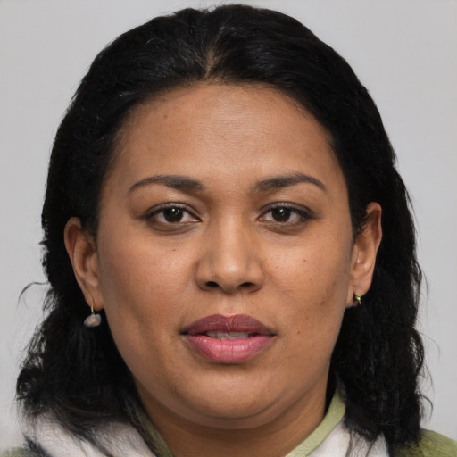 Joyful black adult female with medium  black hair and brown eyes