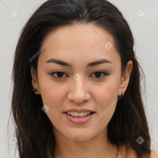 Joyful latino young-adult female with long  brown hair and brown eyes