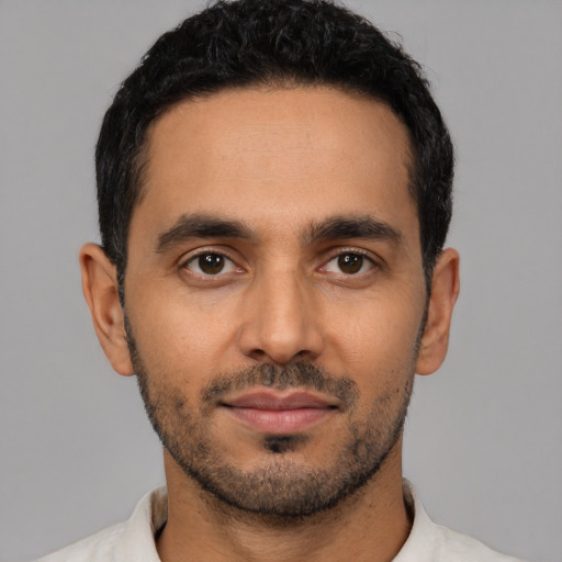 Neutral latino young-adult male with short  black hair and brown eyes
