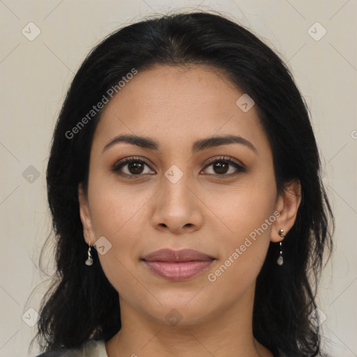 Joyful latino young-adult female with long  brown hair and brown eyes