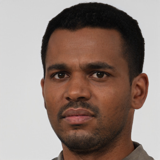 Neutral black young-adult male with short  black hair and brown eyes