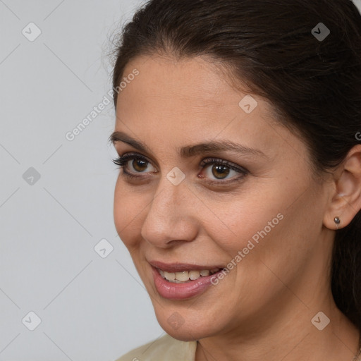 Joyful white young-adult female with medium  brown hair and brown eyes