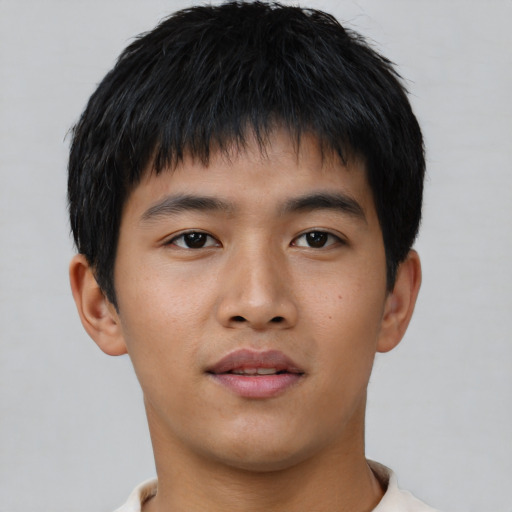 Neutral asian young-adult male with short  brown hair and brown eyes