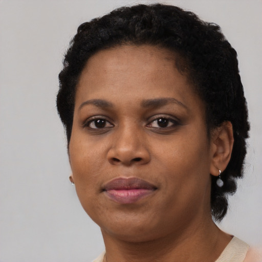 Neutral black young-adult female with short  black hair and brown eyes