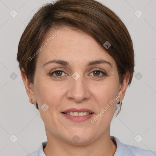 Joyful white adult female with short  brown hair and brown eyes