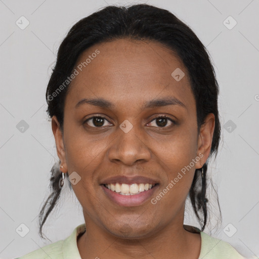 Joyful black young-adult female with medium  black hair and brown eyes