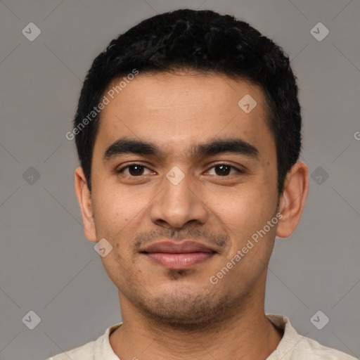 Joyful latino young-adult male with short  black hair and brown eyes