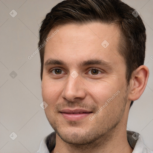 Joyful white young-adult male with short  brown hair and brown eyes