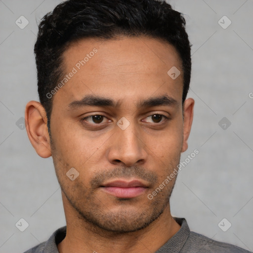 Neutral latino young-adult male with short  black hair and brown eyes