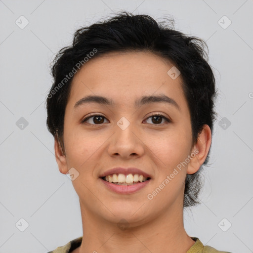 Joyful asian young-adult female with short  brown hair and brown eyes