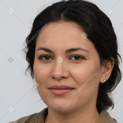 Joyful white adult female with medium  brown hair and brown eyes