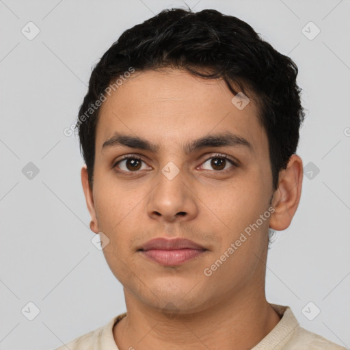 Neutral latino young-adult male with short  black hair and brown eyes