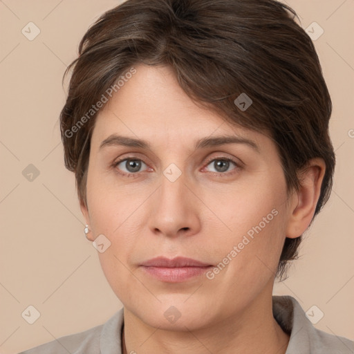 Neutral white young-adult female with short  brown hair and brown eyes