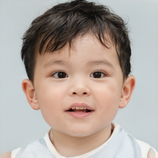 Joyful white child male with short  brown hair and brown eyes