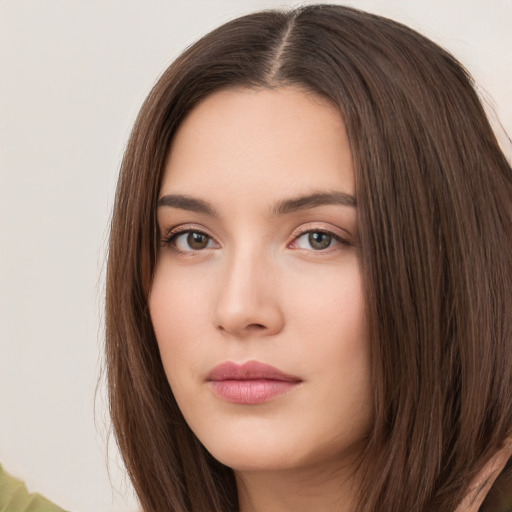 Neutral white young-adult female with long  brown hair and brown eyes