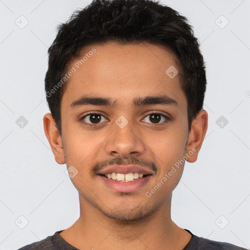 Joyful latino young-adult male with short  black hair and brown eyes