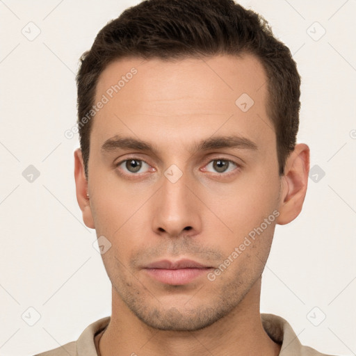 Neutral white young-adult male with short  brown hair and brown eyes