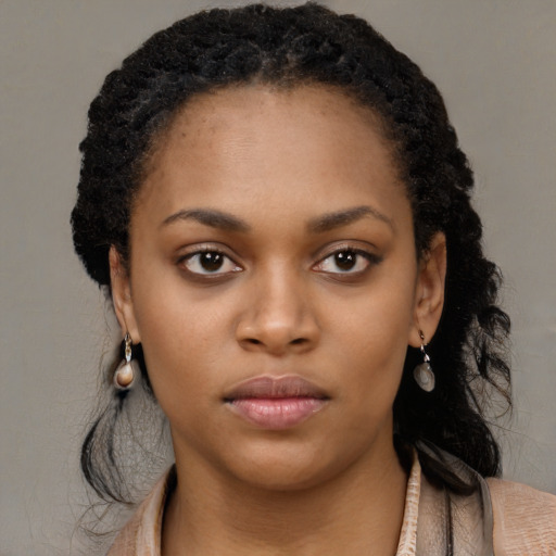 Neutral black young-adult female with long  black hair and brown eyes