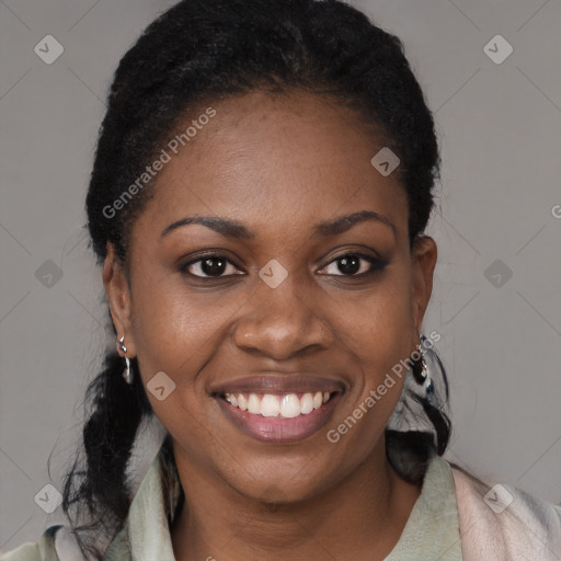 Joyful black young-adult female with medium  black hair and brown eyes