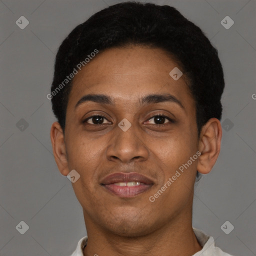 Joyful black young-adult female with short  brown hair and brown eyes