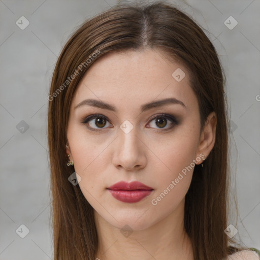 Neutral white young-adult female with long  brown hair and brown eyes