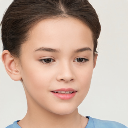 Joyful white child female with short  brown hair and brown eyes