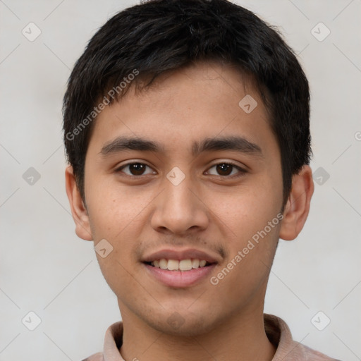 Joyful white young-adult male with short  brown hair and brown eyes