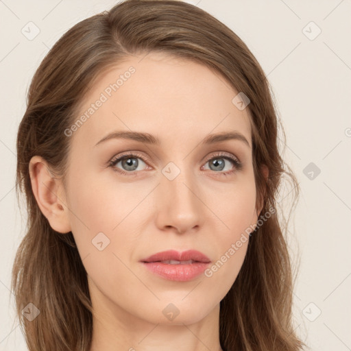 Joyful white young-adult female with long  brown hair and blue eyes