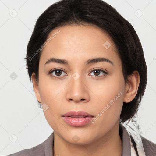 Neutral latino young-adult female with medium  brown hair and brown eyes