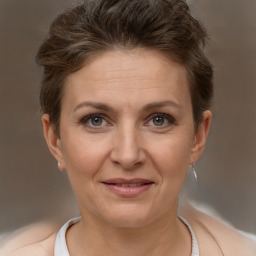 Joyful white adult female with short  brown hair and brown eyes