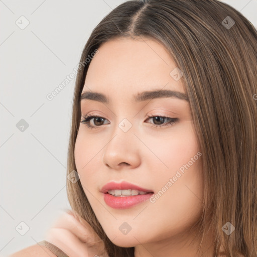 Neutral white young-adult female with long  brown hair and brown eyes