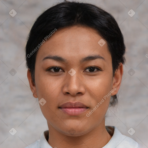 Joyful asian young-adult female with short  black hair and brown eyes