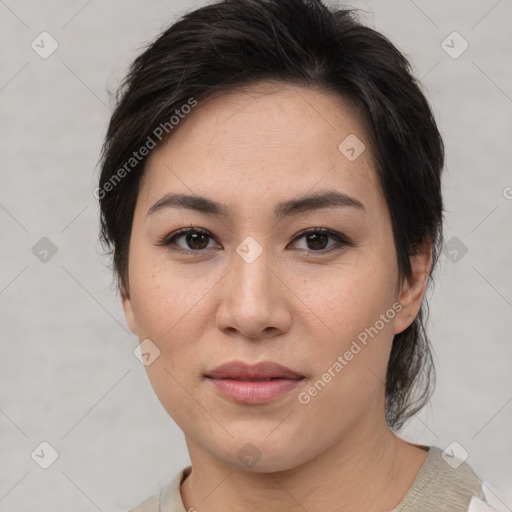 Joyful asian young-adult female with medium  brown hair and brown eyes