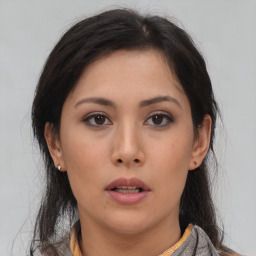 Neutral asian young-adult female with medium  brown hair and brown eyes