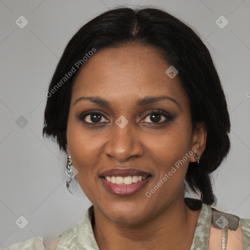 Joyful black adult female with medium  black hair and brown eyes