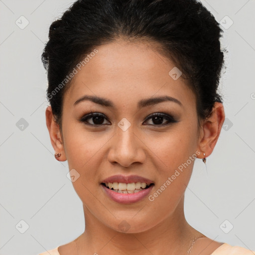 Joyful latino young-adult female with short  brown hair and brown eyes