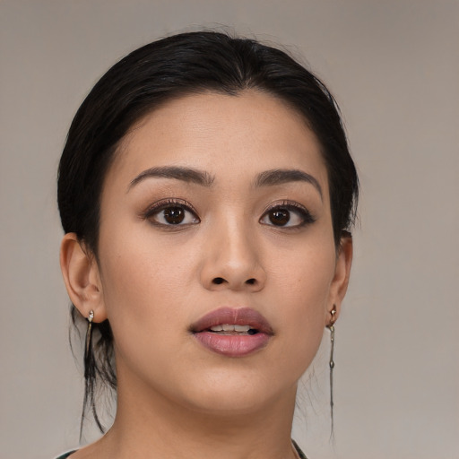 Neutral asian young-adult female with medium  brown hair and brown eyes
