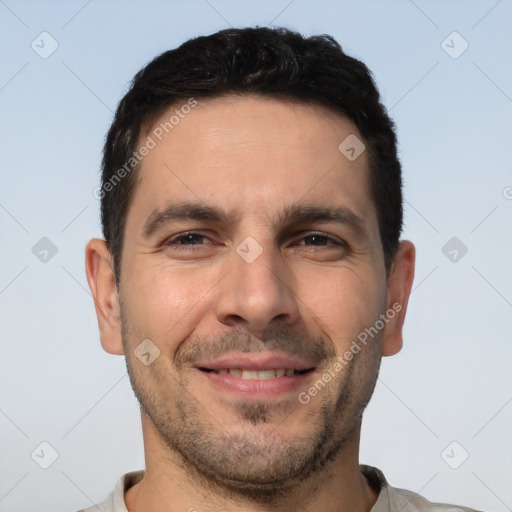 Joyful white young-adult male with short  brown hair and brown eyes