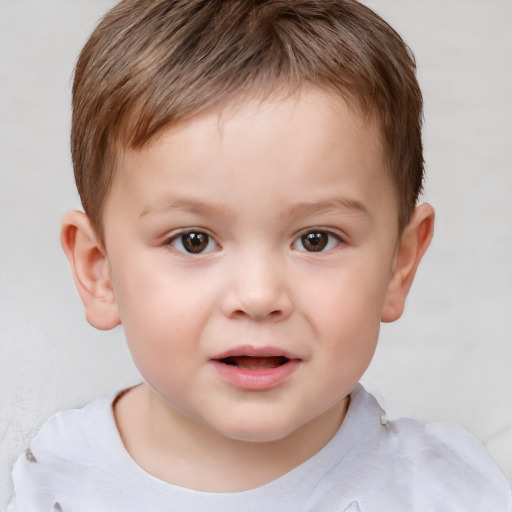 Joyful white child male with short  brown hair and brown eyes