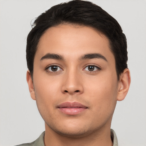 Neutral latino young-adult male with short  brown hair and brown eyes